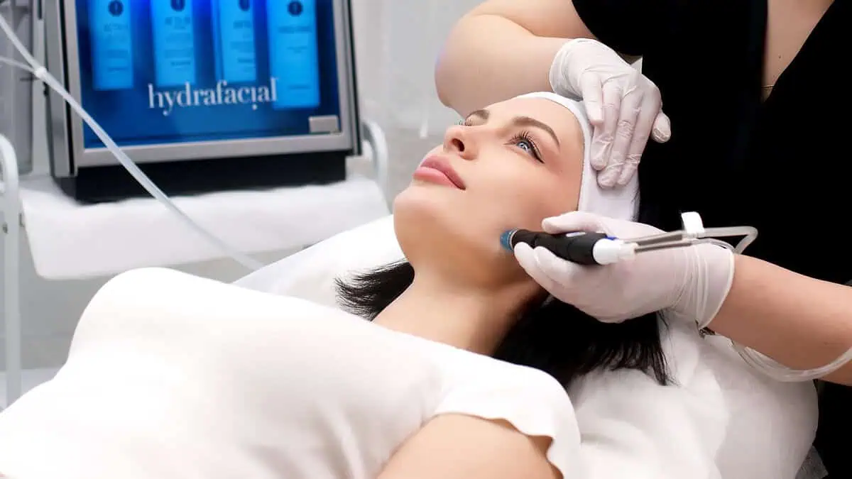 Woman receiving a professional HydraFacial Treatment at LadyBelle Med Spa in Fountain Valley, CA